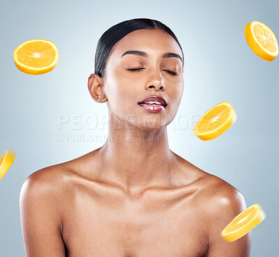 Buy stock photo Cropped shot of an attractive young woman posing in studio against a grey background