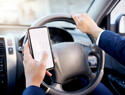 Buy stock photo Closeup shot of an unrecognisable businessman using a cellphone while driving a car