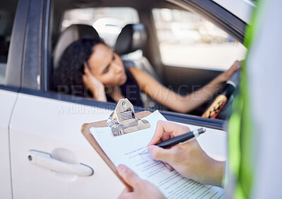 Buy stock photo Closeup shot of a traffic officer issuing a woman with a ticket