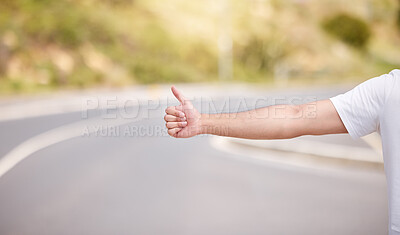 Buy stock photo Thumbs up, travel and person hitch hiking on road trip for adventure, exploring and lift in nature. Lost, outdoor and tourist trekking on highway wait on street for carpool on journey in countryside.