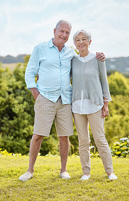Buy stock photo Shot of a senior couple standing together outside