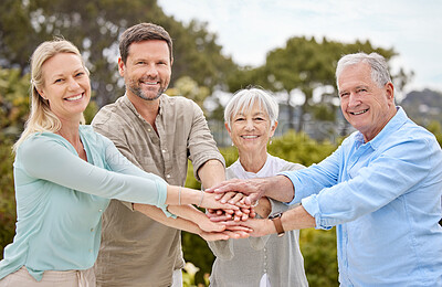 Buy stock photo Happy family, portrait and stacking hands with support in nature for bonding, collaboration or unity together. People, teamwork and piling with smile for mission, coordination or solidarity at park