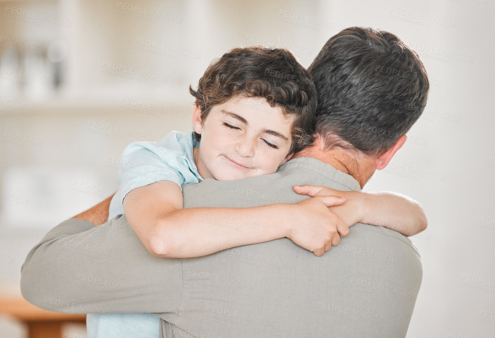 Buy stock photo Man, child and hug in family home for affection, support or care as parent for love or happiness. Male people, embrace and together in living room in bonding, development or nurture as father and son