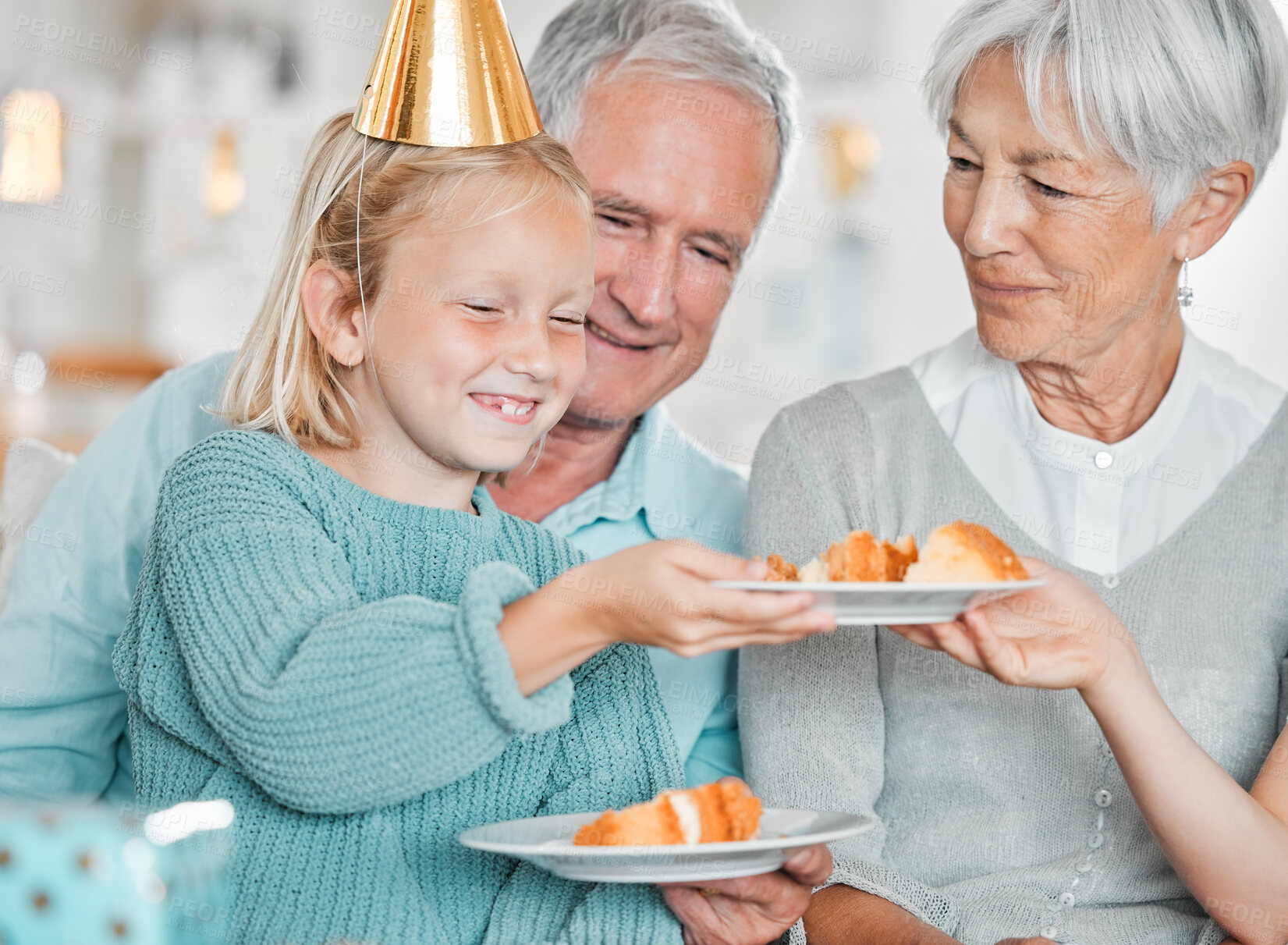 Buy stock photo Grandmother, girl and plate with birthday cake, family or smile for celebration with bonding in home. Eating, child and happy senior grandfather for dessert, party hat or growth with love in house