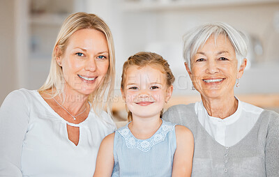 Buy stock photo Shot of a little girl spending time with her mother and grandmother at home