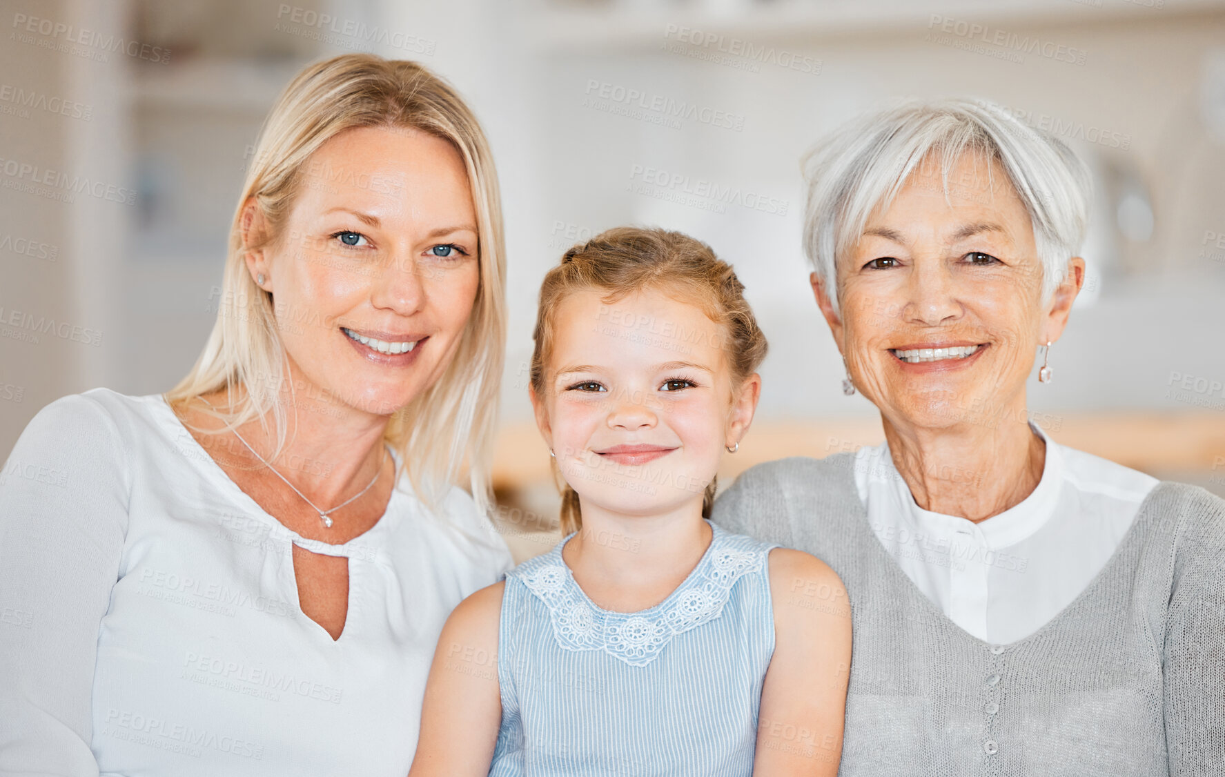 Buy stock photo Shot of a little girl spending time with her mother and grandmother at home