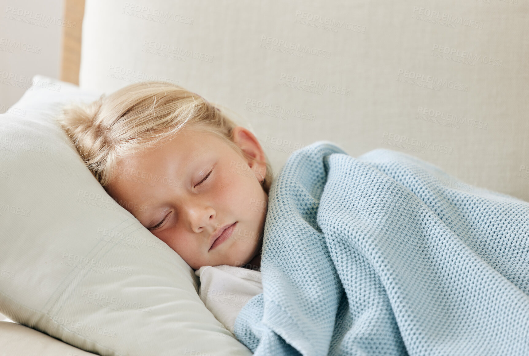 Buy stock photo Sleeping, illness and tired with child on sofa of lounge for sickness, healthcare and virus recovery. Fatigue, dreaming and safety with young girl in living room of family home for disease and cold