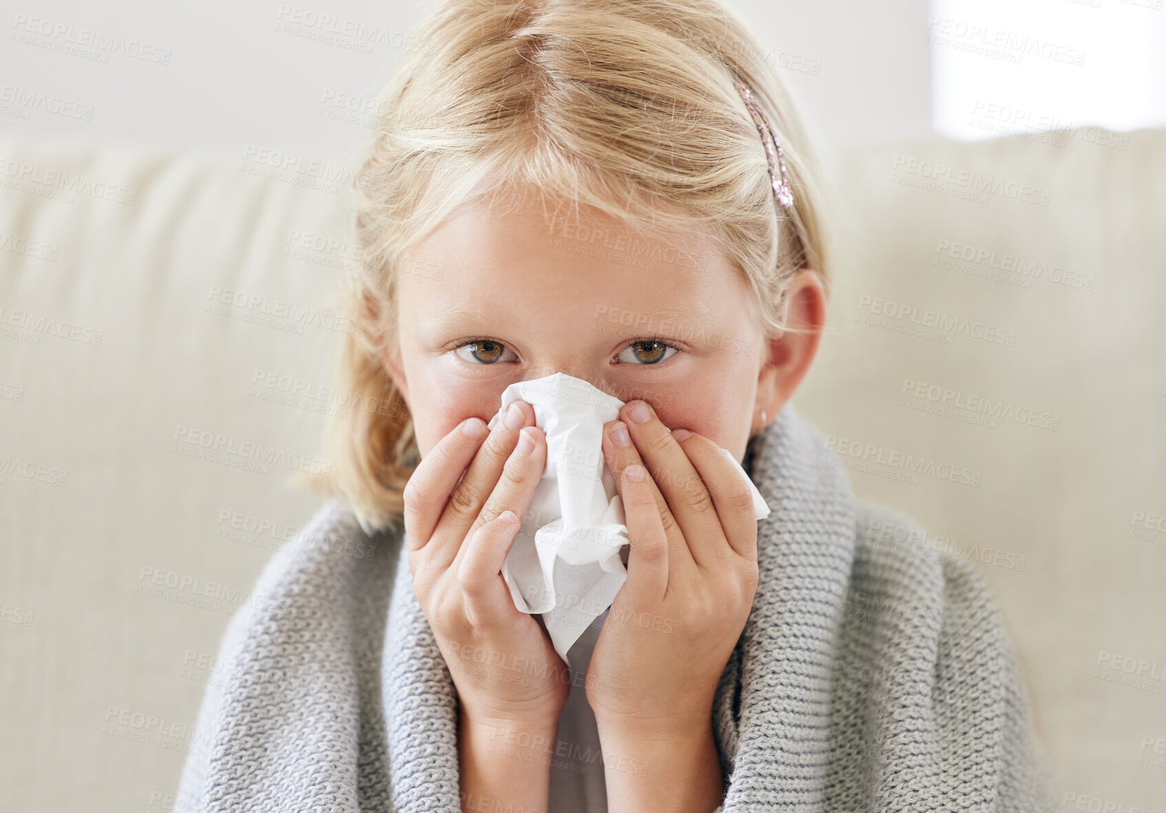 Buy stock photo Blowing nose, flu and portrait of girl in blanket on sofa of home living room with allergies or hayfever. Cold, tissue and virus with kid in apartment for recovery from illness, infection or sickness