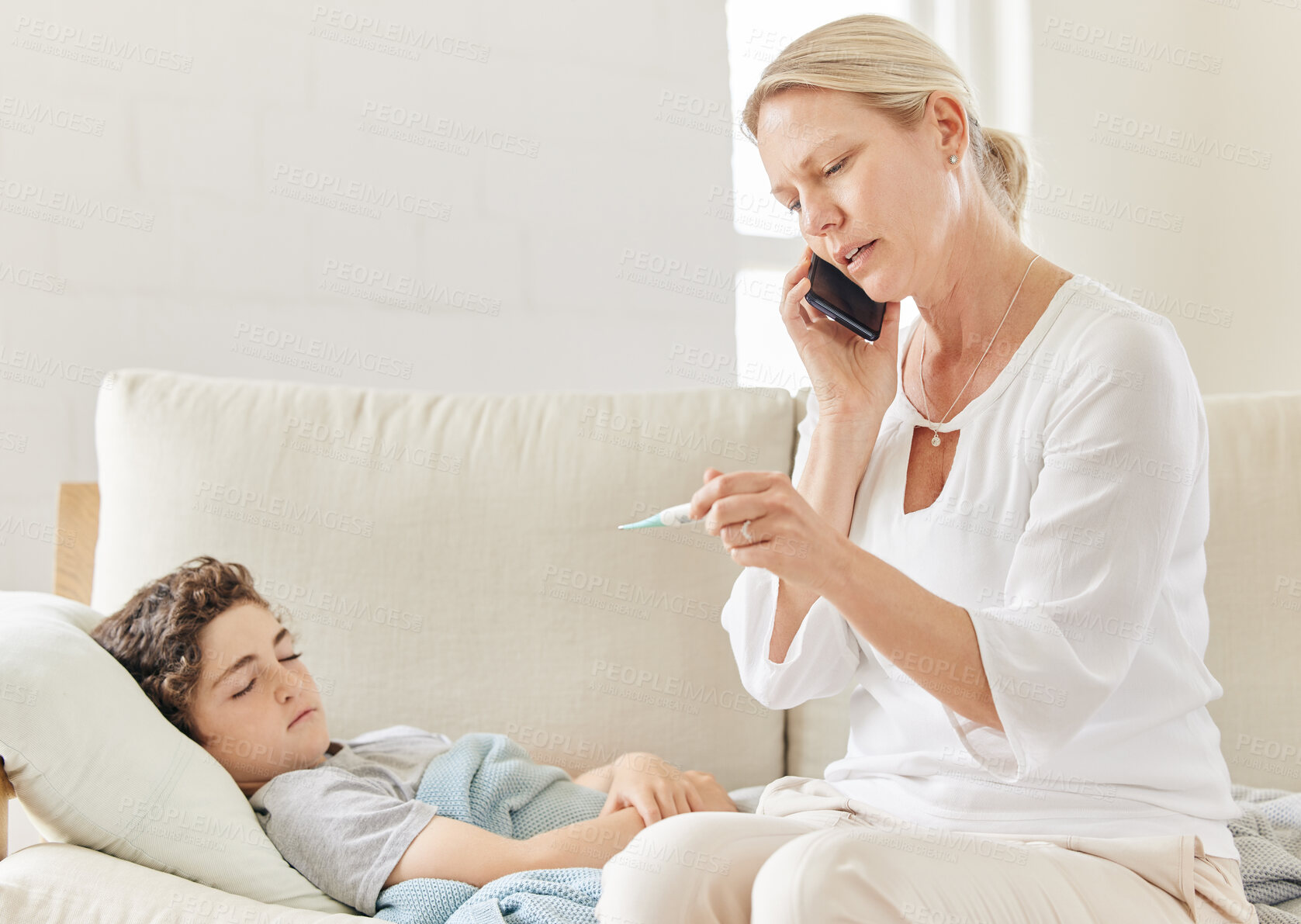 Buy stock photo Mother, child and phone call with thermometer for fever symptoms or cold virus as concern or care. Woman, boy and sick in home with temperature or results for wellness or medical advice on mobile