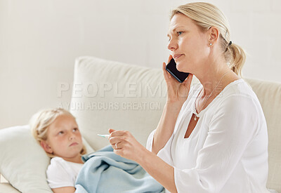 Buy stock photo Shot of a young mother using a cellphone to call a doctor for her sick daughter