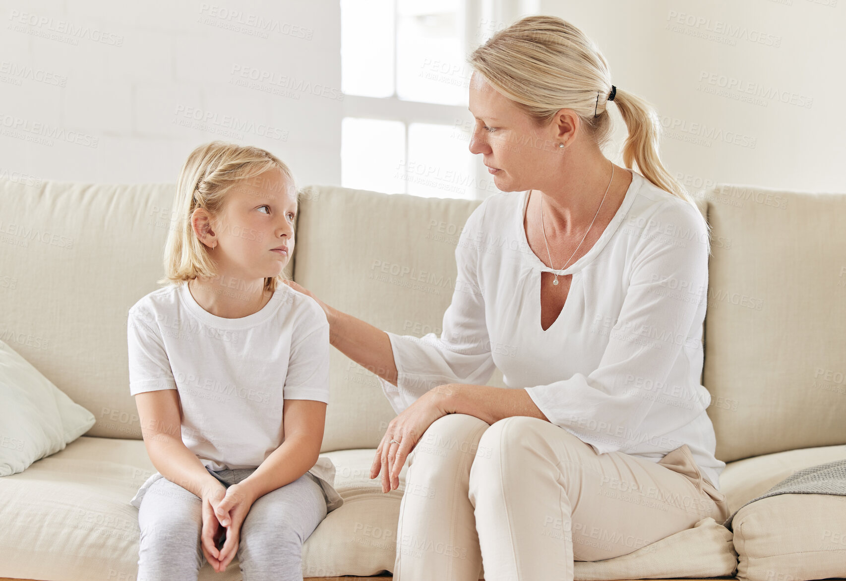 Buy stock photo Sad, support and comfort with mother with girl for bullying, protection and empathy in family home. Sympathy, compassion and woman psychologist with child victim for safety, care or help for trauma