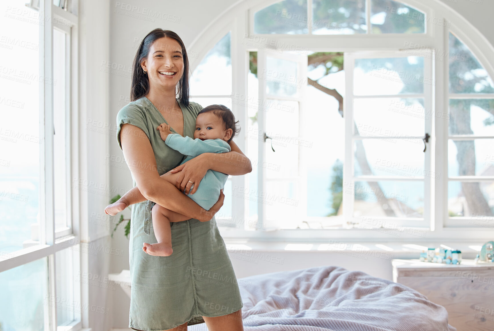 Buy stock photo Portrait, happy mother and holding baby in home for love, care or quality time together for childcare development. Mom carrying infant kid, newborn girl and smile in support, comfort and nursery room