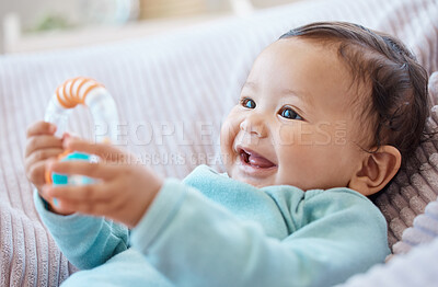 Buy stock photo Happy baby, rattle and child in bedroom for childhood development, growth and cute smile at home. Adorable young girl, infant kid and playing with toys for happiness, fun and relax in nursery room