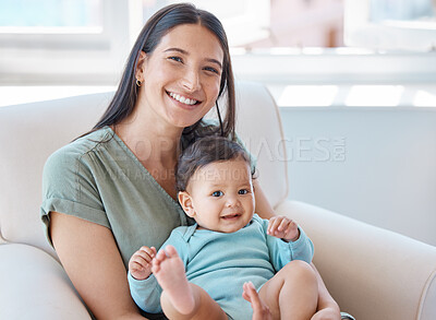 Buy stock photo Portrait of mom, baby girl and smile on sofa in home for love, child care and quality time together. Mother, happy infant kid and relaxing on couch in living room for support, bonding and happiness 