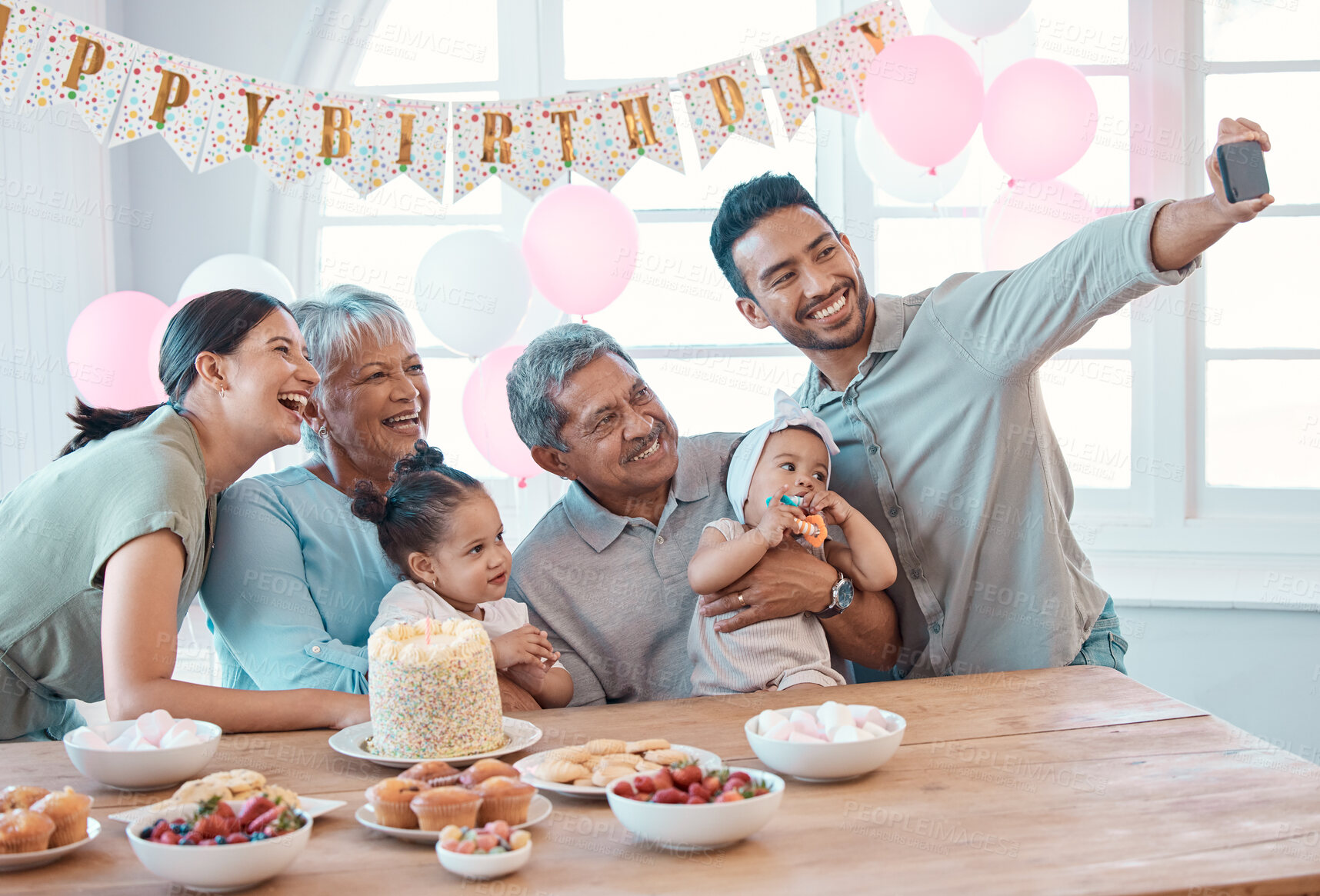 Buy stock photo Happy family, birthday or selfie with children for photography, memory or celebration moment at home. Grandparents, parents and kids with smile for picture, capture or special event by table at house