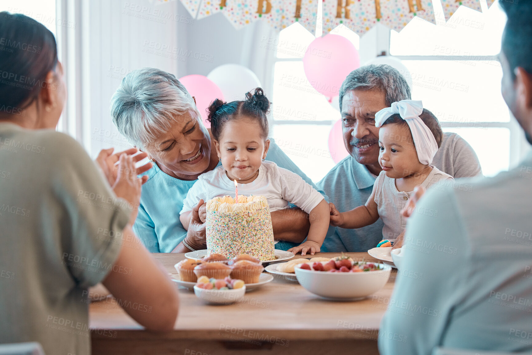 Buy stock photo Big family, senior couple and grandchildren with party, cake and love for home birthday celebration. Mature man, woman and parents with children, support and event for retirement and holiday bonding