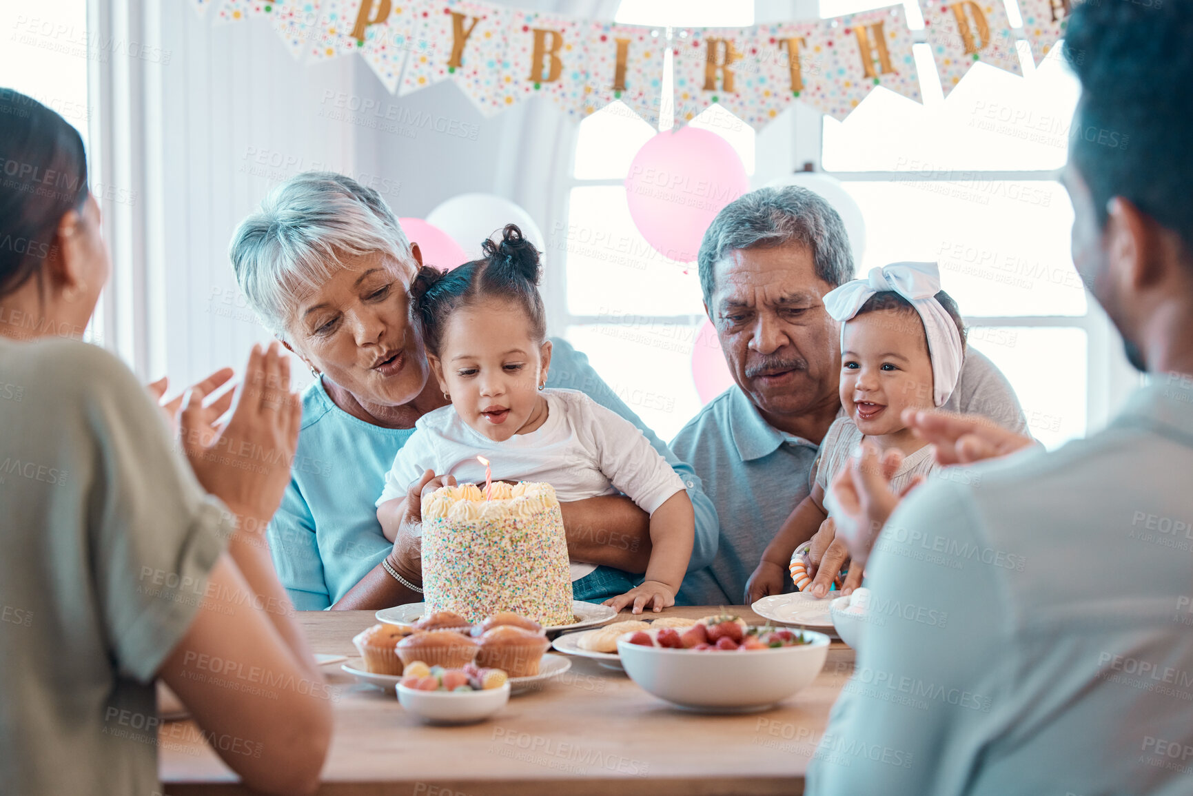 Buy stock photo Big family, grandparents and children with party, cake and love for home birthday celebration. Senior man, woman and parents with grandkids, support and event for retirement and holiday bonding