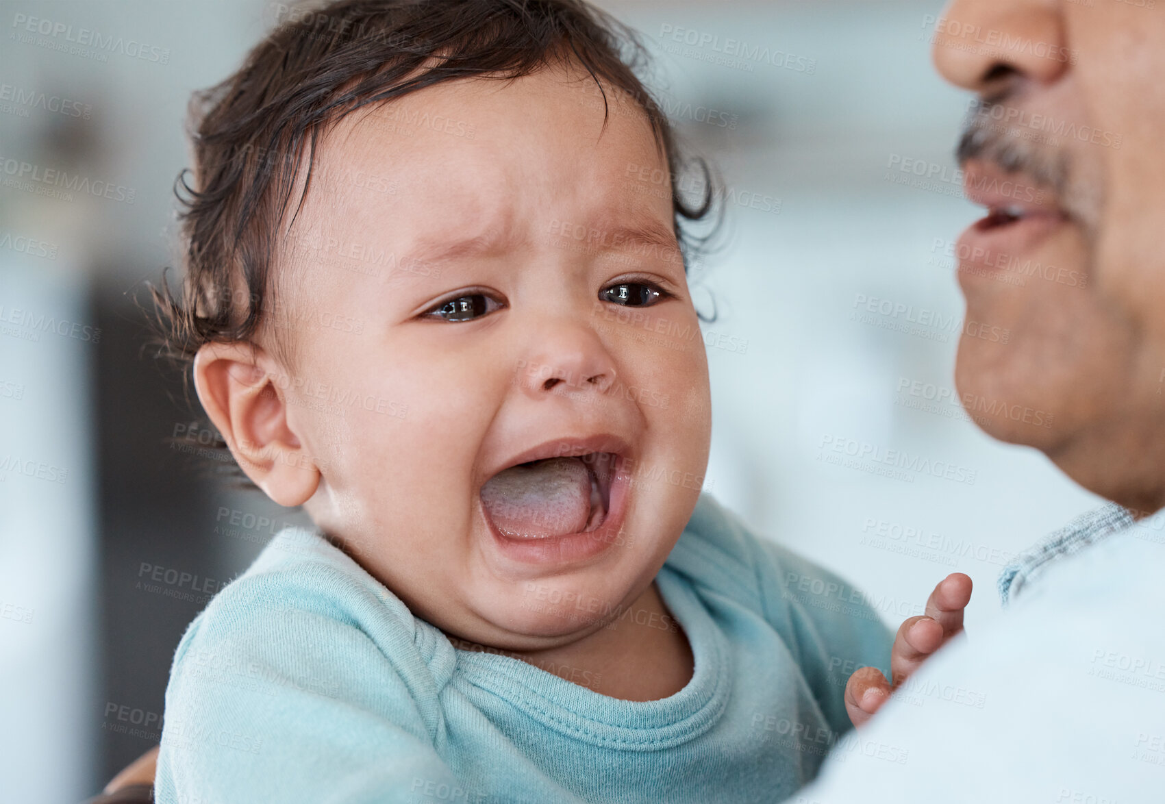 Buy stock photo Senior man, grandfather and crying baby at home with bonding, support and care. Apartment, people and emotional infant for visit on break with trust, love and comfort for child growth or development