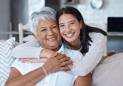 Buy stock photo Hug, mothers day and portrait of women smile for care, trust and support on a sofa or couch in a home together. Happiness, love and elderly mother and daughter relax in a living room or lounge