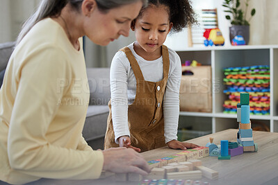 Buy stock photo Shot of a little girl playing with toys in a psychologists office