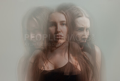 Buy stock photo Studio shot of a young woman experiencing mental anguish