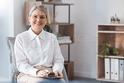 Buy stock photo Shot of a mature psychologist sitting in her practice during the day