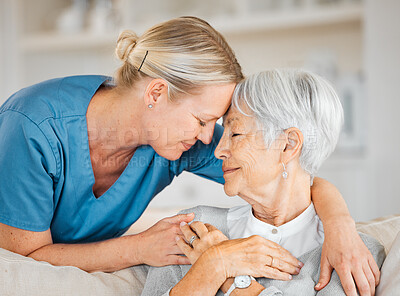 Buy stock photo Shot of a nurse caring for a senior woman at home