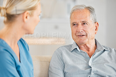 Buy stock photo Shot of a nurse caring for a senior man at home