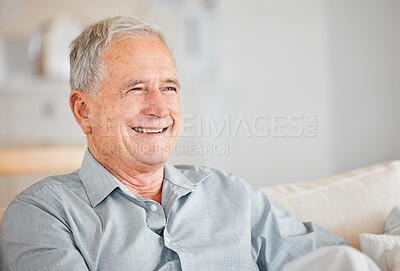 Buy stock photo Shot of a senior man looking thoughtful at home