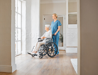 Buy stock photo Shot of a nurse caring for a senior woman in a wheelchair in a retirement home