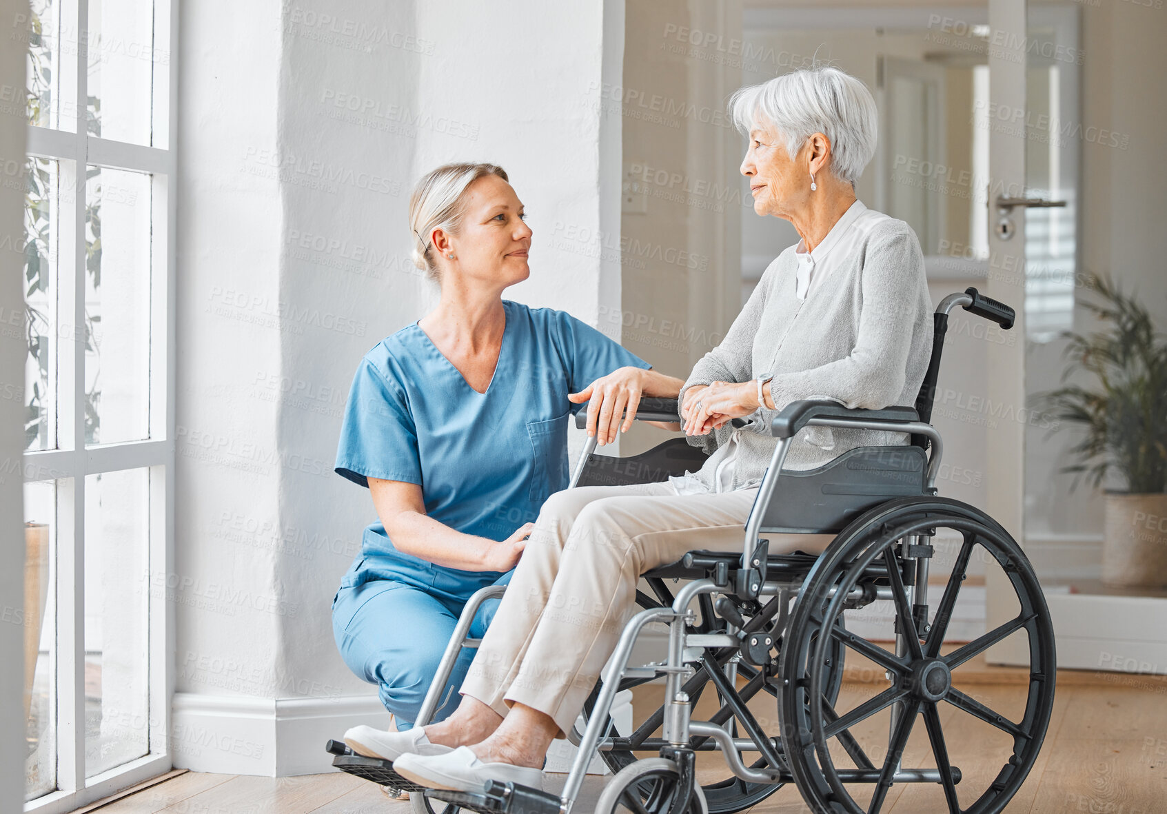 Buy stock photo Home, caregiver and old woman in wheelchair for support, assistance and rehabilitation with smile. House service, nurse and senior patient with disability for recovery, retirement and help with care