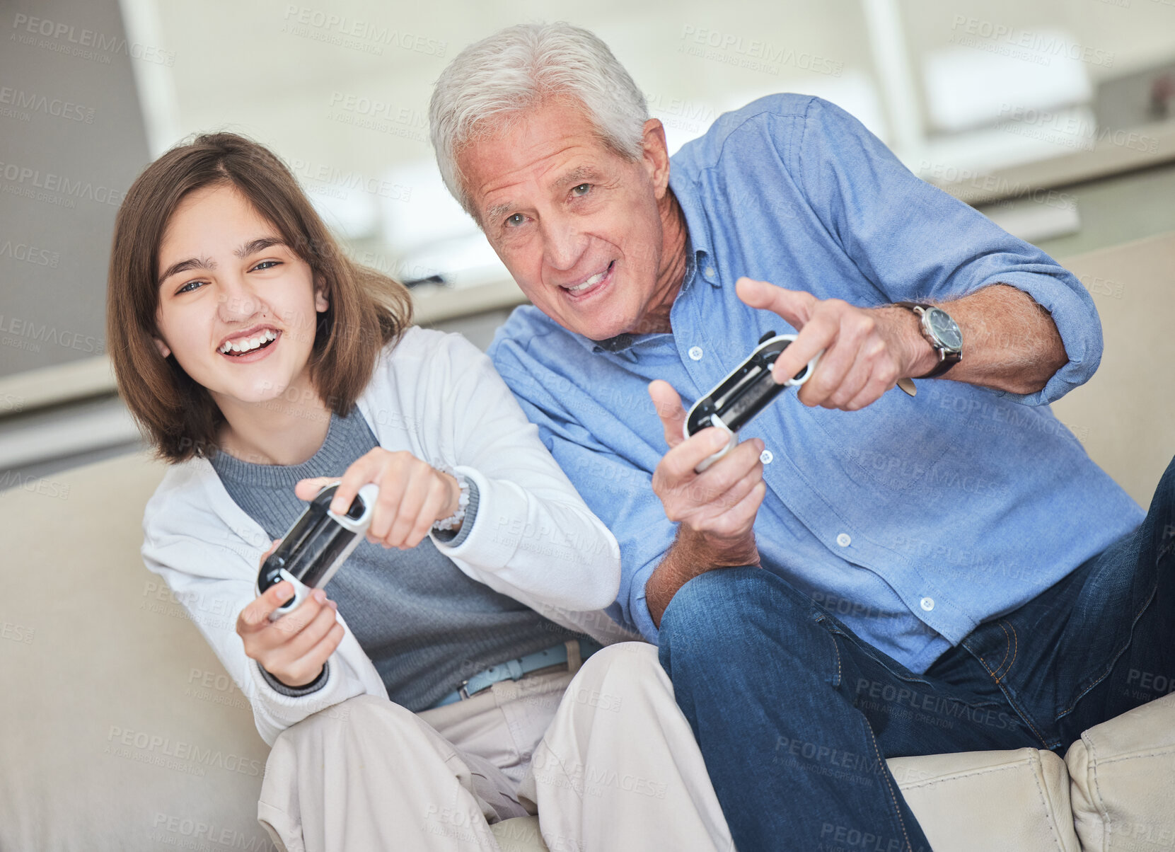 Buy stock photo Gaming, competition with old man and child on sofa for esports, bonding and technology. Video game, happy and challenge with senior person and girl in living room of family home for online streaming