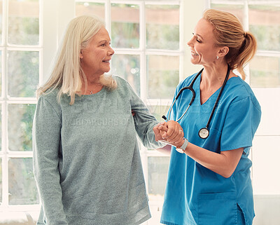 Buy stock photo Elderly woman, nurse and support in nursing home for care, assistance and smile for trust. Senior person, caregiver and help in retirement for comfort, holding hands and empathy in assisted living