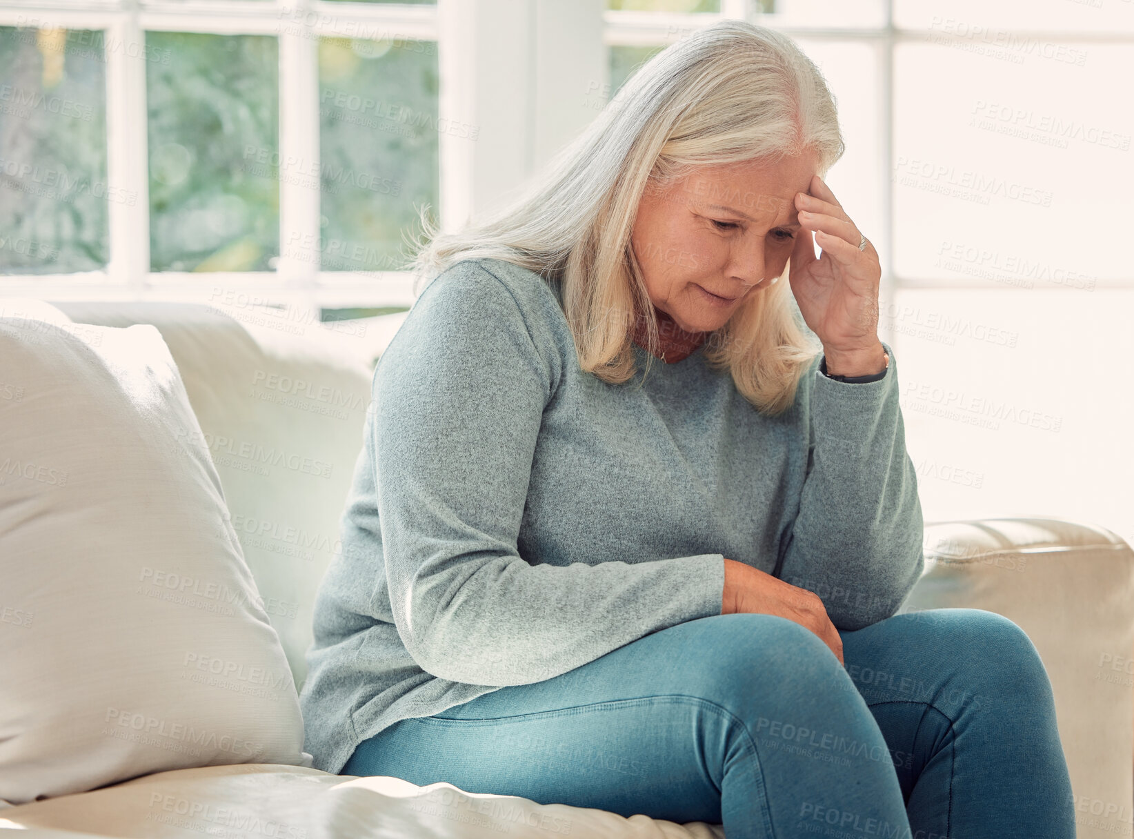 Buy stock photo Stress, depression and senior woman in home with regret, worry or thinking of past trauma. Headache, retirement and sad person with mental health challenge, financial crisis or anxiety in living room