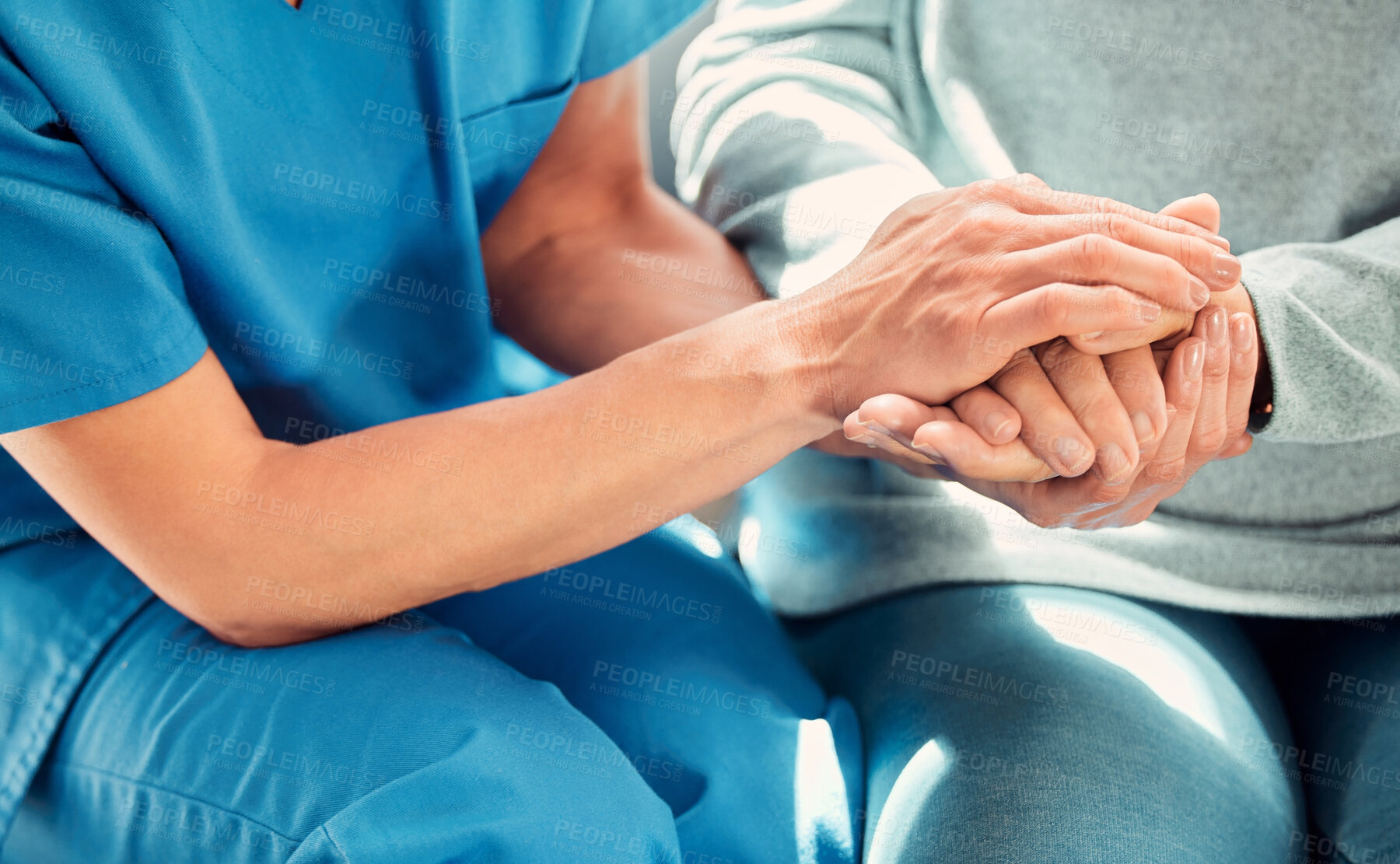 Buy stock photo Holding hands, support and caregiver with senior person for care and trust in a nursing home for people in retirement. Nurse, help and elderly woman or patient with a professional for medical advice