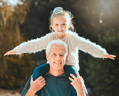 Buy stock photo Portrait, shoulders and outdoor with grandfather, girl and bonding together with happiness. Face, smile and senior man carrying kid, playing and childhood with fun, family and cheerful with break