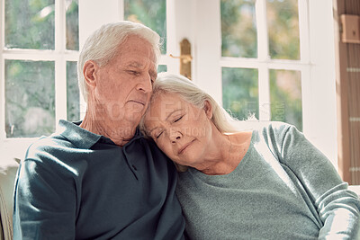 Buy stock photo Love, relax and mature couple hug in home, living room and bonding or sleeping together with support. Retirement, holiday and senior man with elderly woman for trust, peace or care in marriage