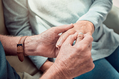 Buy stock photo Hands, engagement ring and senior couple for marriage proposal, connection or trust in retirement. Elderly people, partner and empathy in living room for love, bonding or relationship in nursing home