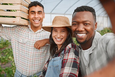 Buy stock photo Portrait of a group of people taking selfies while working together on a farm