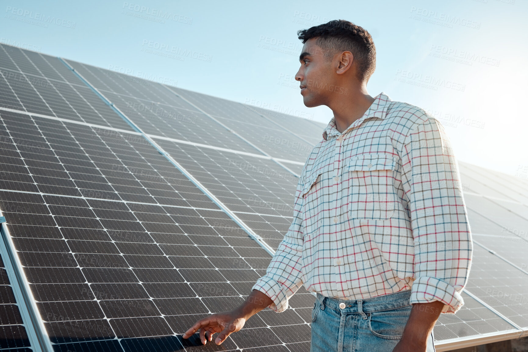 Buy stock photo Solar panels, electricity and man on farm for inspection, maintenance and installation. Agriculture, renewable energy and person thinking for planning, building infrastructure or sustainable power