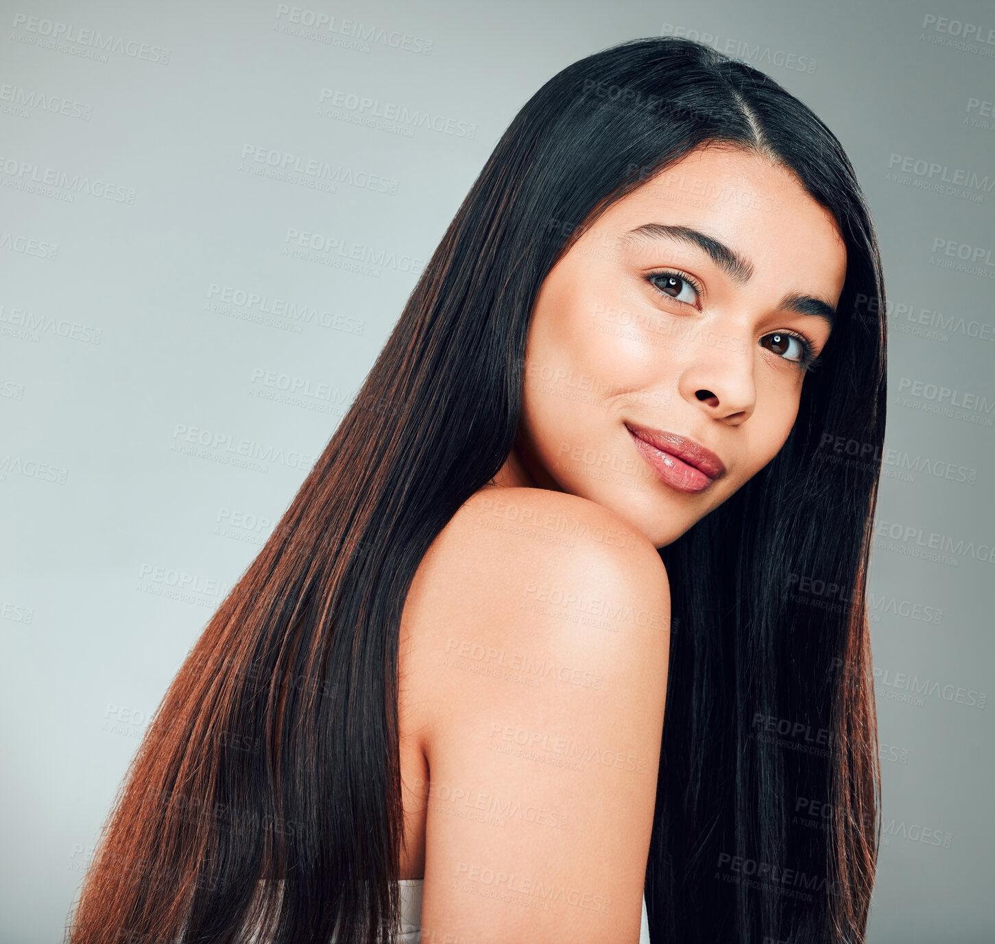 Buy stock photo Studio shot of a beautiful young woman with long brown hair