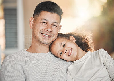 Buy stock photo Shot of a father and daughter on the sofa at home