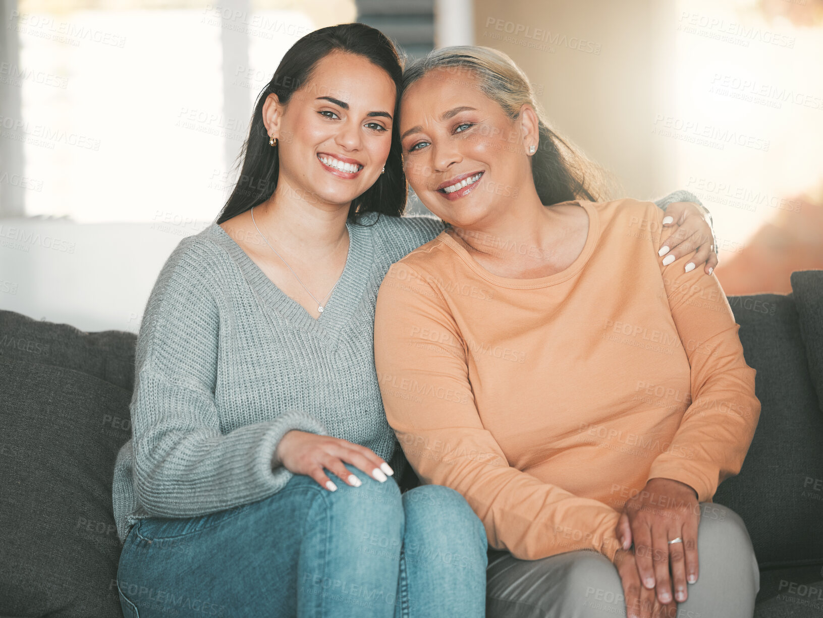 Buy stock photo Mature mother, woman and portrait with love for family, hug and happy on sofa in home. Mom, adult daughter and smile in living room for visit, bonding and affection or appreciation for care and trust