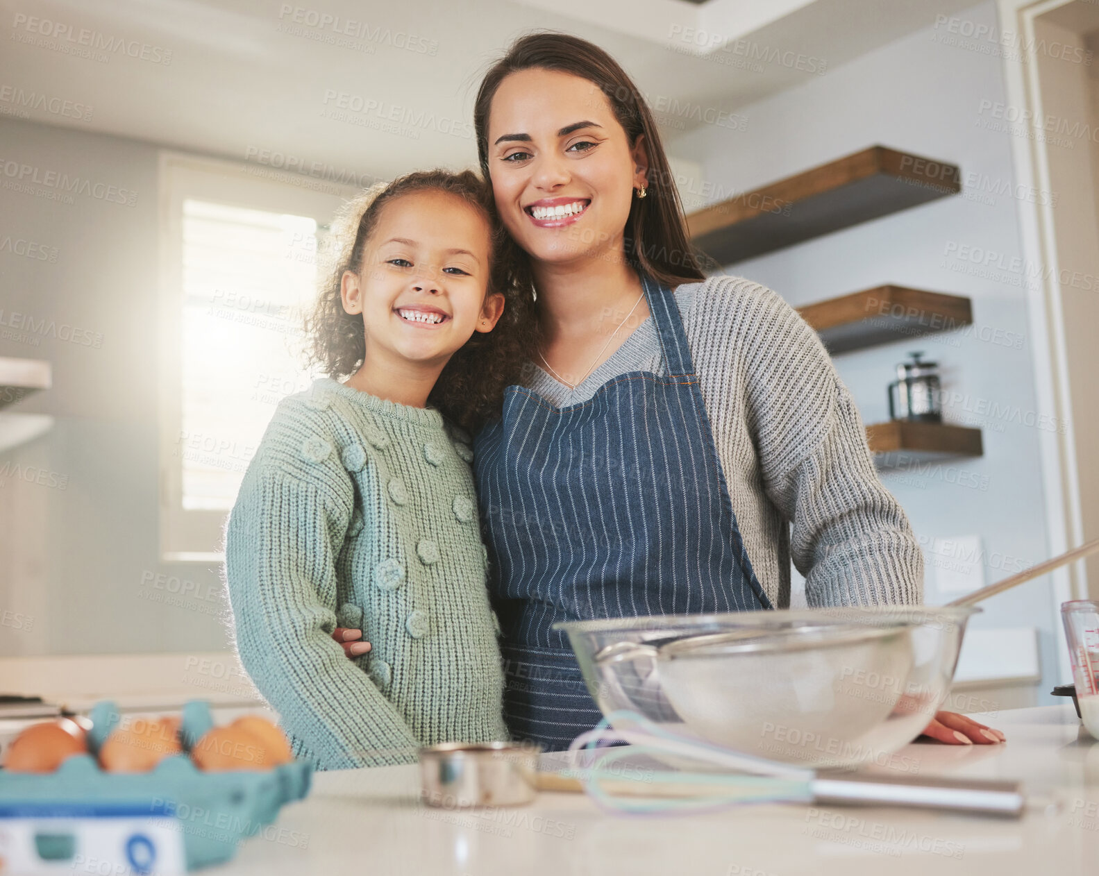 Buy stock photo Mother, child and portrait in kitchen for baking, fun activity and relationship development at home. Mom, young girl and happy at counter for support, learning and love in apartment for teaching