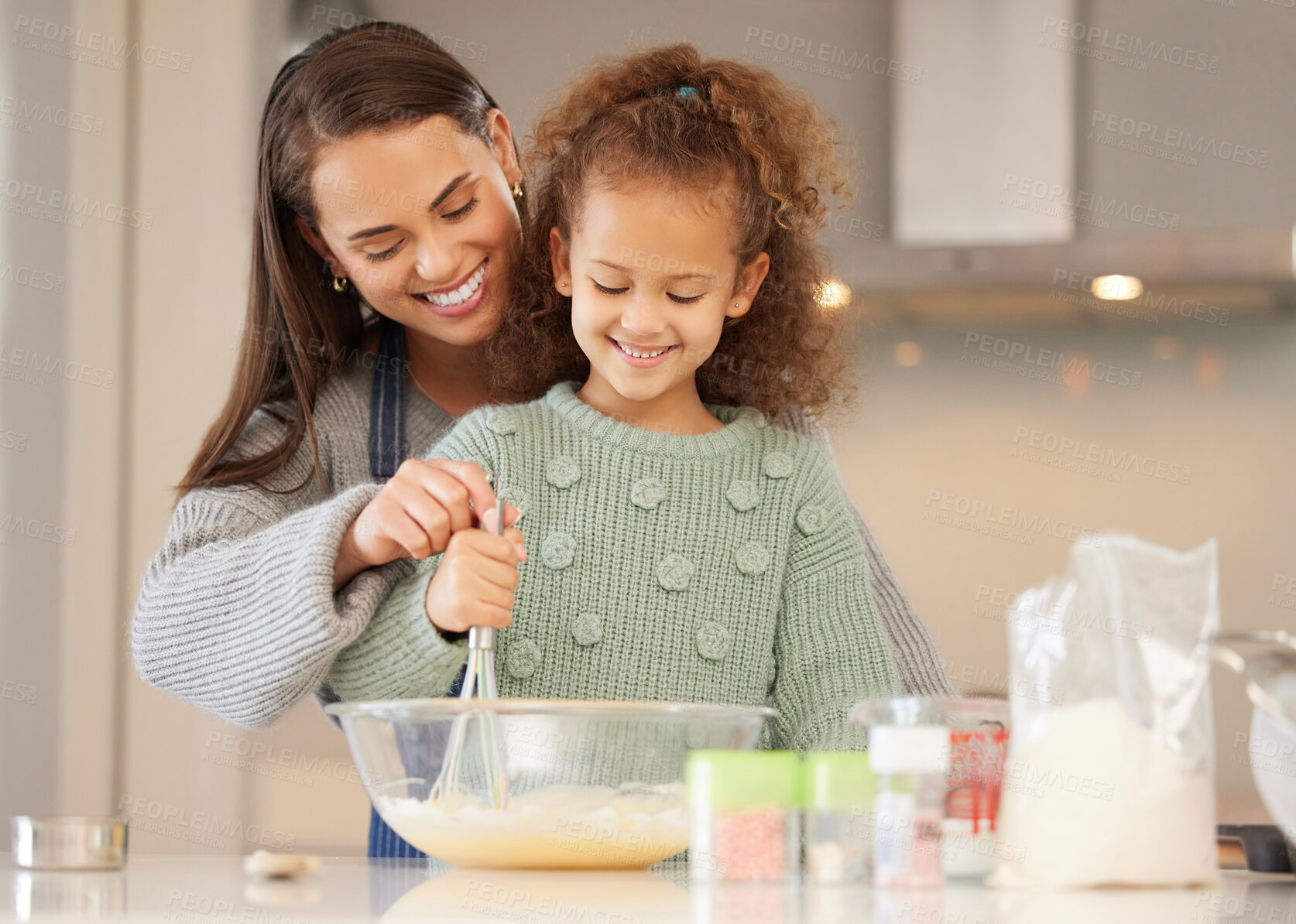 Buy stock photo Mixing, mom or girl child baking with help, lesson or food for learning to prepare ingredients in home. Happy parent, dessert or mother teaching kid cooking skills for development or breakfast recipe