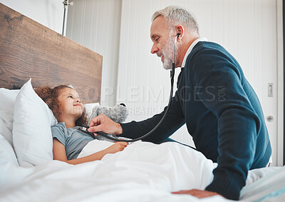 Buy stock photo Shot of a doctor doing a checkup on a little girl at home