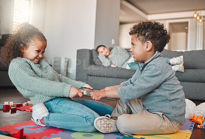 Buy stock photo Brother, sister and tablet with fighting in living room of home for competition or sibling rivalry. Conflict, fighting or technology with boy and girl child arguing in apartment for screen time