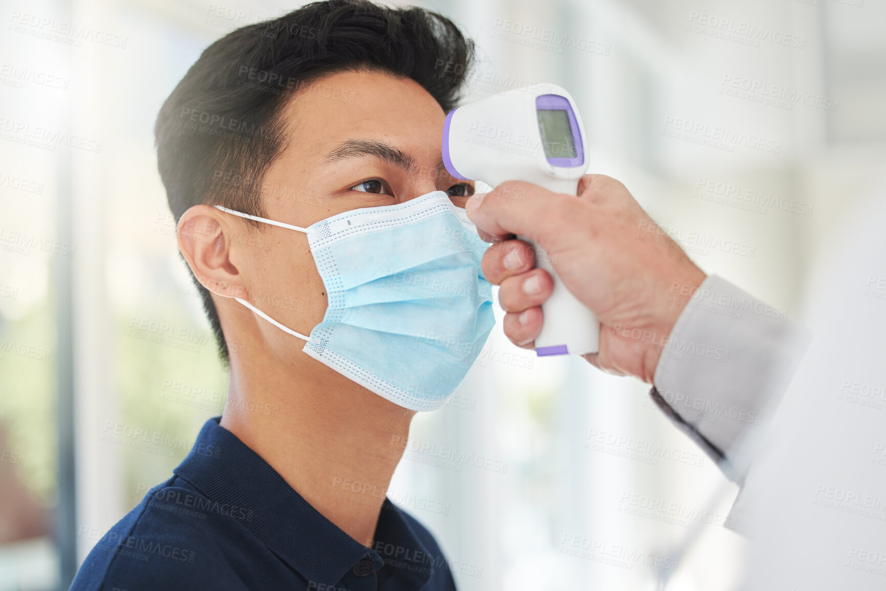 Buy stock photo Doctor, man and face mask with thermometer, health and vaccine for growth or development in clinic. Male person, physician and temperature at hospital for symptoms, checkup and disease prevention