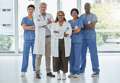 Buy stock photo Leadership portrait, doctors and nurses with arms crossed standing together in hospital. Face, teamwork and confident medical professionals, group or happy surgeons with collaboration for healthcare