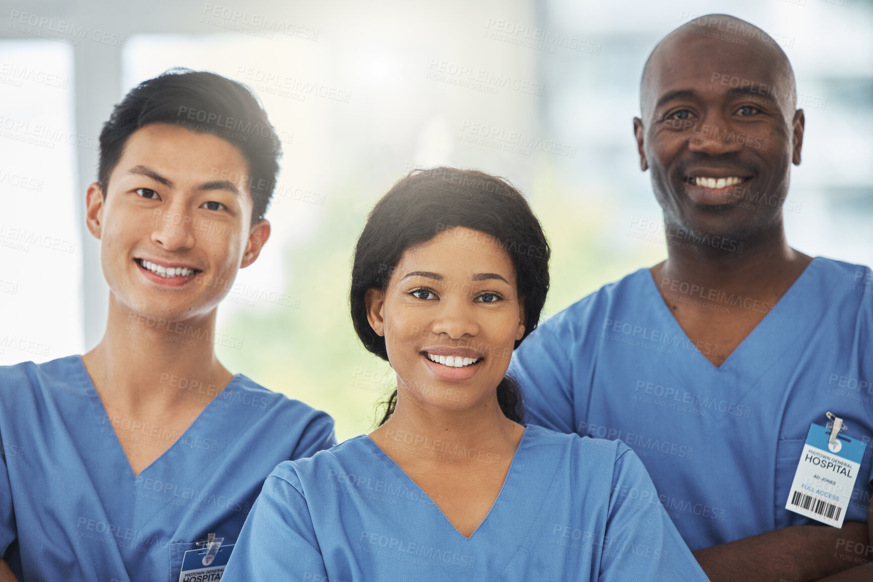 Buy stock photo Medical, confidence and portrait of doctors with crossed arms standing in hospital. Leadership, diversity and group of professional healthcare workers with smile in collaboration at medicare clinic.